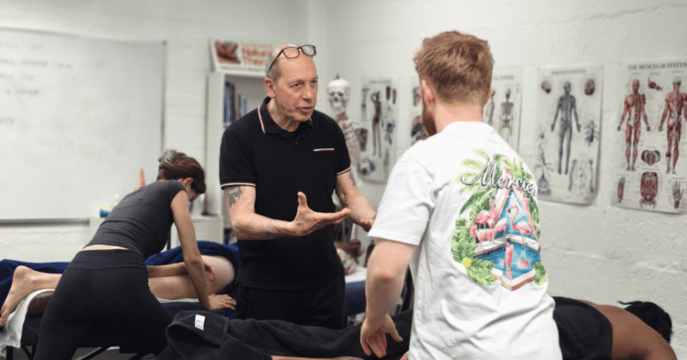 Tutor Trevor explaining instructions to a student